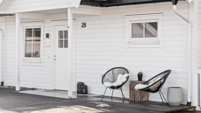 Et overbygget inngangsparti ønsker deg velkommen hjem.