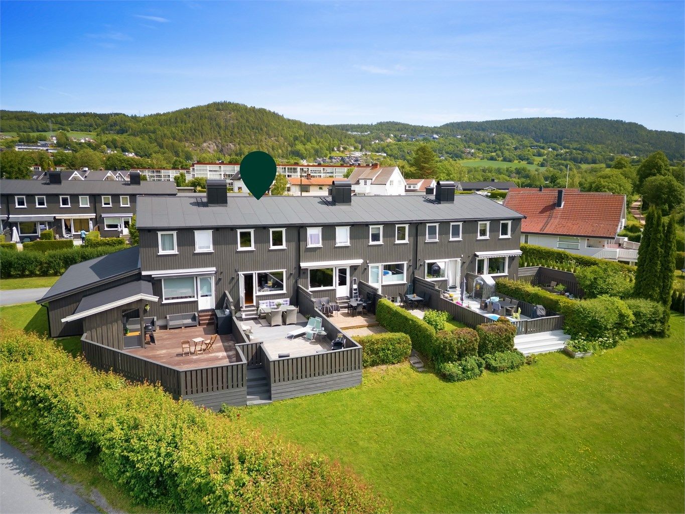 Pent og velholdt rekkehus med 3 etasjer