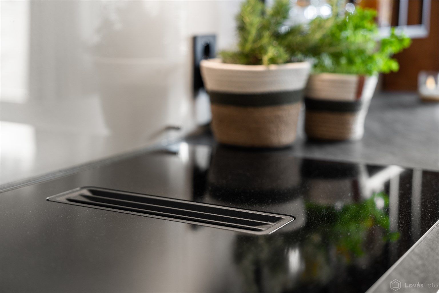 Den moderne platetoppen har en integrert ventilator.