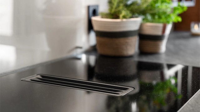 Den moderne platetoppen har en integrert ventilator.