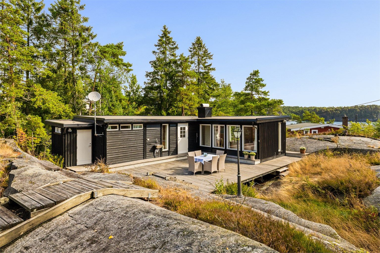 Den lune terrassekroken har adkomst til bod og utslagsvask.