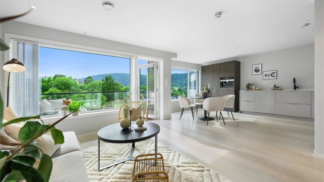 Fantoftvegen 15! Lekker toppleilighet. Store vindusflater og svært romslig åpen stue- og kjøkkenløsning.