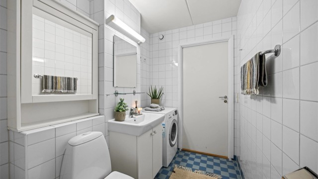 Badet har også opplegg til vaskemaskin.