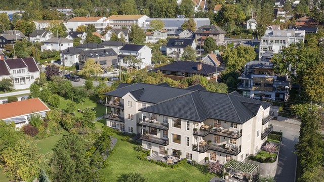 Illustrasjon av prosjektet som er under bygging i Marienlundveien 8. Nygget er over kun 3 etasjer, og trukket helt ned til tomtegrensen mot syd, lengst vekk fra villaen i Jomfrubråtveien 84D