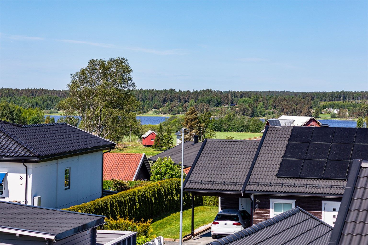 Utsikt fra altanen til Sæbyvannet - fremhevet med zoom.