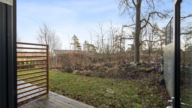 Stilrent enderekkehus med idyllisk beliggenhet.