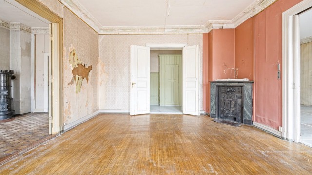 En kamin gir et klassisk preg og en ekstra oppvarmingskilde.