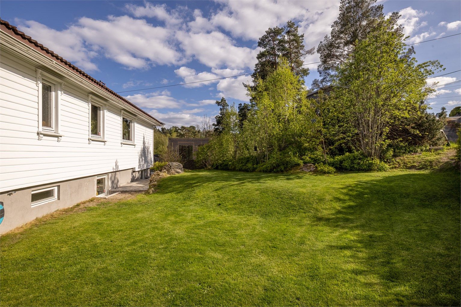 Hagen har gode solforhold og er året gjennom en fin tumleplass for familien.