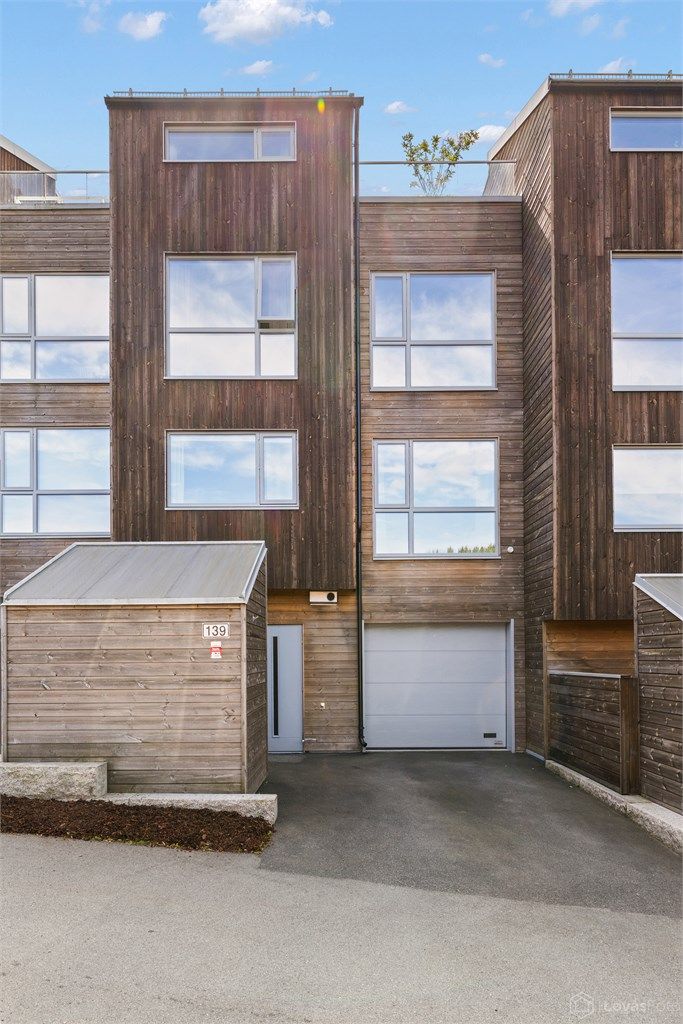  Sameiet består av 27 boligseksjoner med en helhetlig arkitektur. Foto: LøvåsFoto