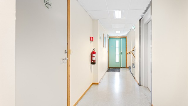 Felles inngangsparti med heis som tar deg til parkeringskjelleren.