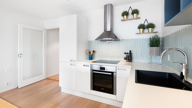 Stilren og moderne kjøkkeninnredning fra det danske designmerket Svane.