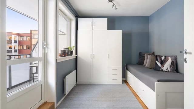 Det tredje soverommet har utgang til leilighetens andre balkong.