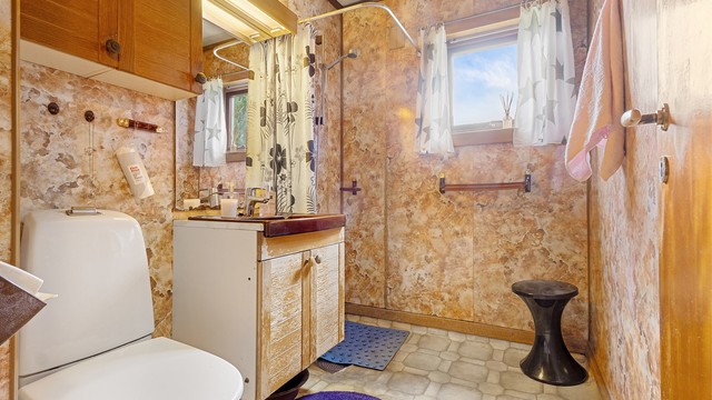 Badet er fra byggeår og har etter en helhetsvurdering fått tilstandsgrad 3.