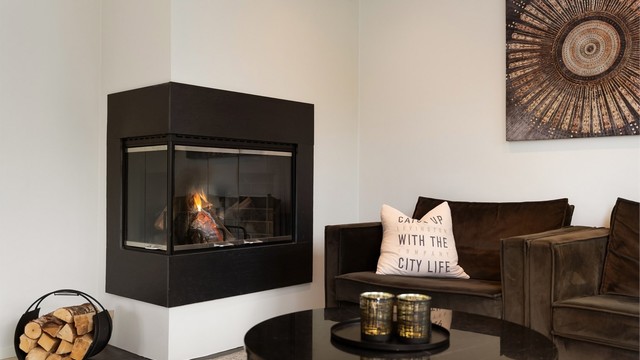 Koselig peis i stuen gir både varme og hygge