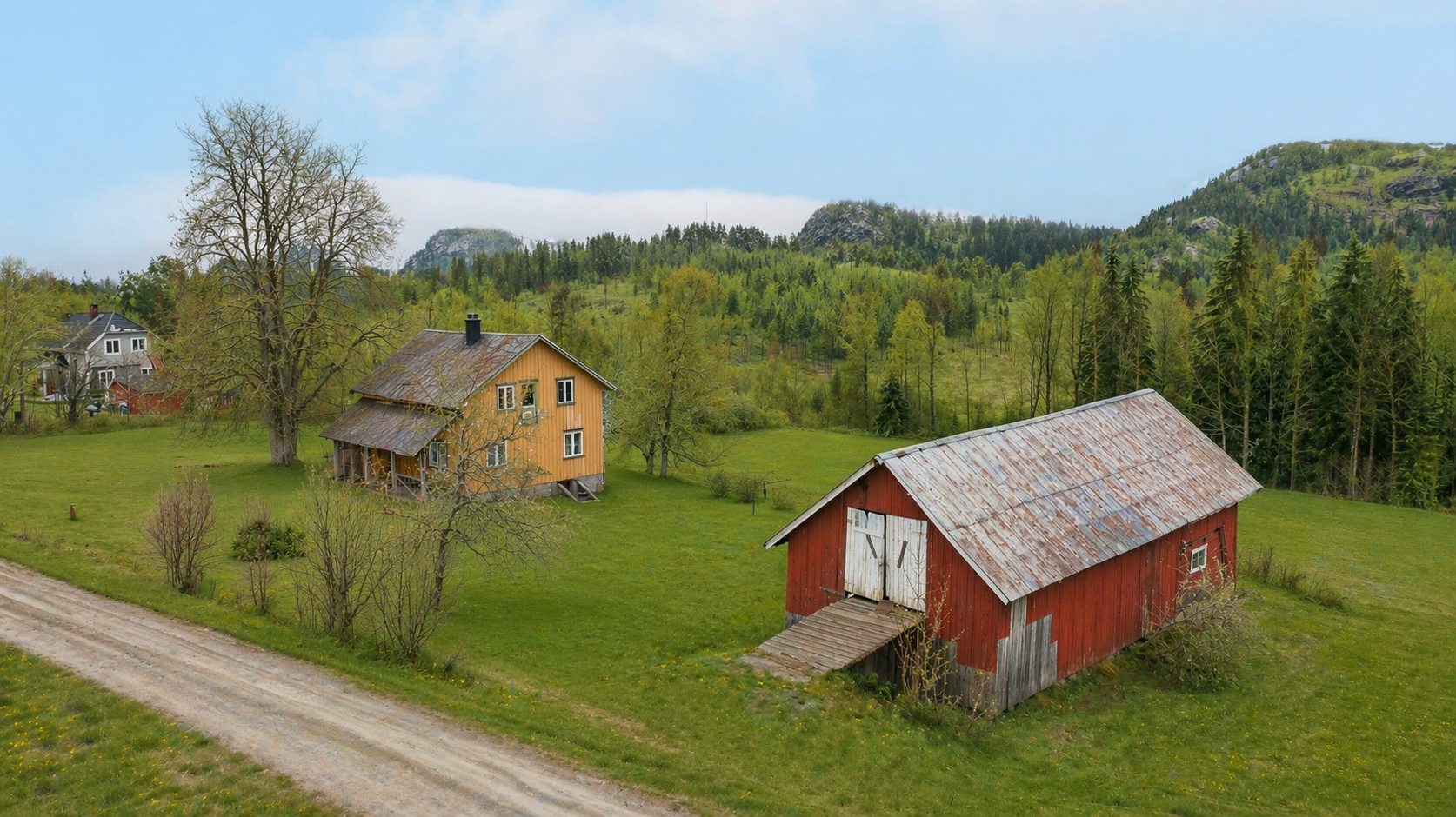 Landlig og idyllisk beliggenhet. 
Foto: Danny Twang. Bildet er redigert med bruk av AI for å fjerne snø, noe avvik kan forekomme. 