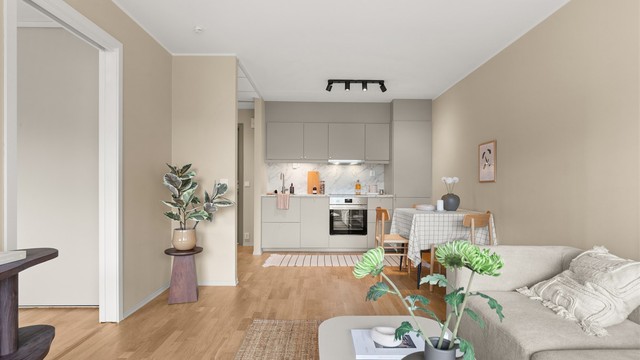 En åpen og sosial løsning mellom stue og det nye IKEA-kjøkkenet gjør dette til et naturlig samlingspunkt i boligen.