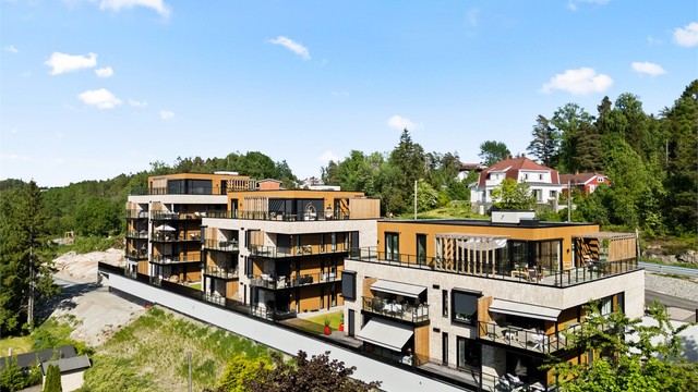Moderne, arkitekttegnede bygg som er godt tilpasset til omgivelsene.