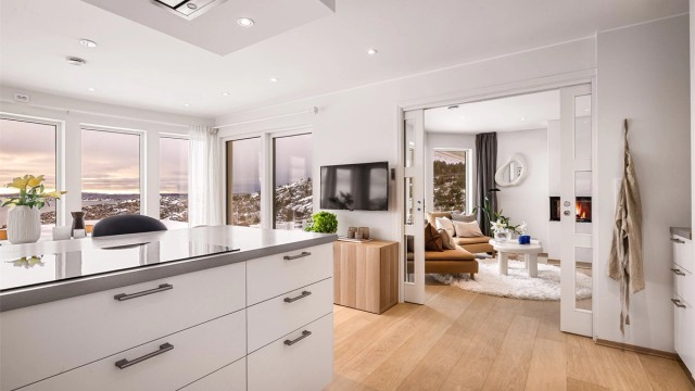 - Elegant løsning med skyvedør med store glassfelt mellom kjøkken og peisestue -