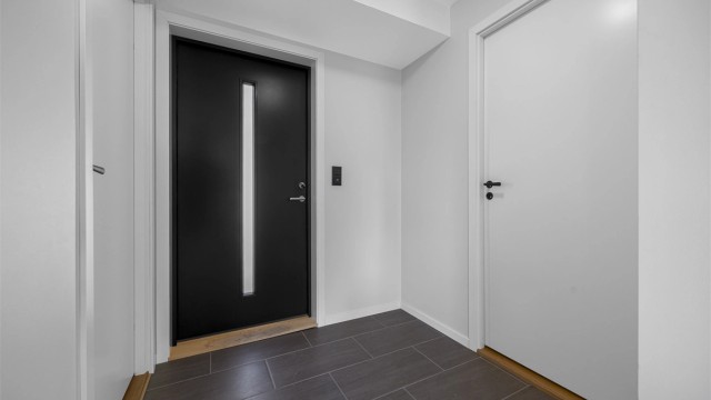 Praktisk entré med tilgang til en innvendig bod på 3 m².