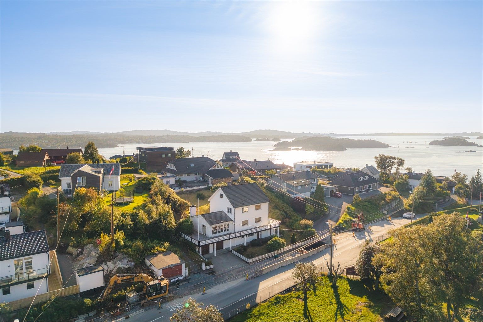 Enebolig over fire plan med godkjent utleiedel i 3. etasje.
Foto: [Fotograf eller fotofirma]