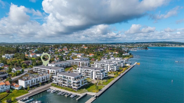 Moderne og arealeffektiv leilighet med balkong og nærhet til sjøen | Parkering og lave felleskostnader