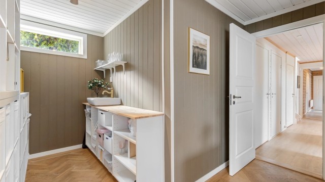Dette rommet gir ytterligere fleksibilitet for lagring eller hobbyaktiviteter.