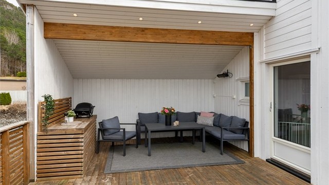 Verandaen er en flott forlengelse av stuen.