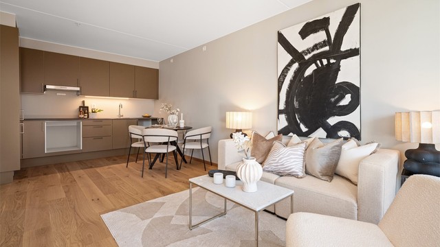 Åpen kjøkkenløsning med god plass til spisebord og sosialt samvær.