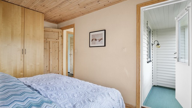 Fra det ene soverommet er det utgang til en egen veranda.