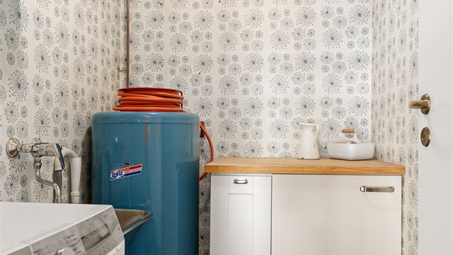 Vaskerom med opplegg for vaskemaskin.