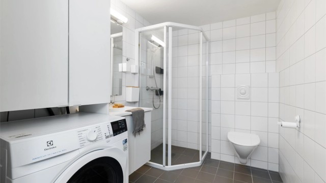 Flislagt bad med varme i gulv