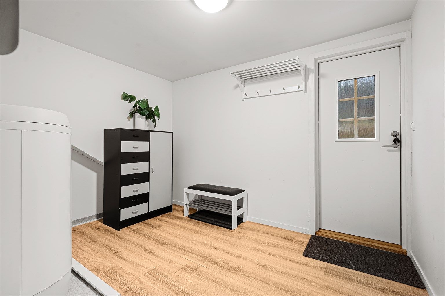 Inngangsparti med plass til oppbevaring.