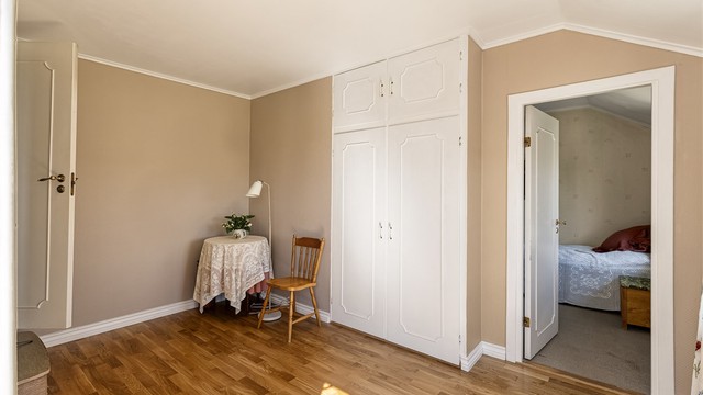 Garderobe og mellomgang til soverom (se salgsoppgaven for nærmere informasjon)
