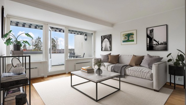 Leiligheten er på ca. 74 kvm. og ligger en trapp ned. Bildet her er digitalt møblert.