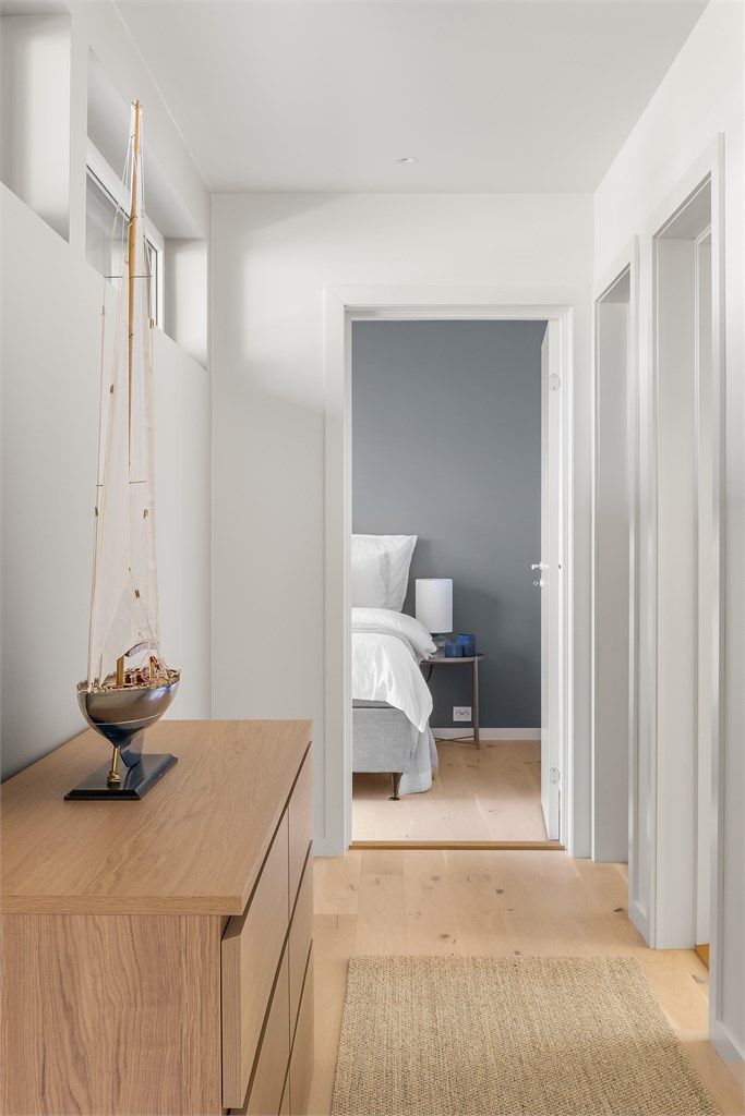 Delikate material- og fargevalg er gjennomgående for hele hytta.