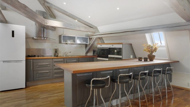 Moderne, tilbaketrukket kjøkken med nydelig kjøkkeninnredning fra Invita.