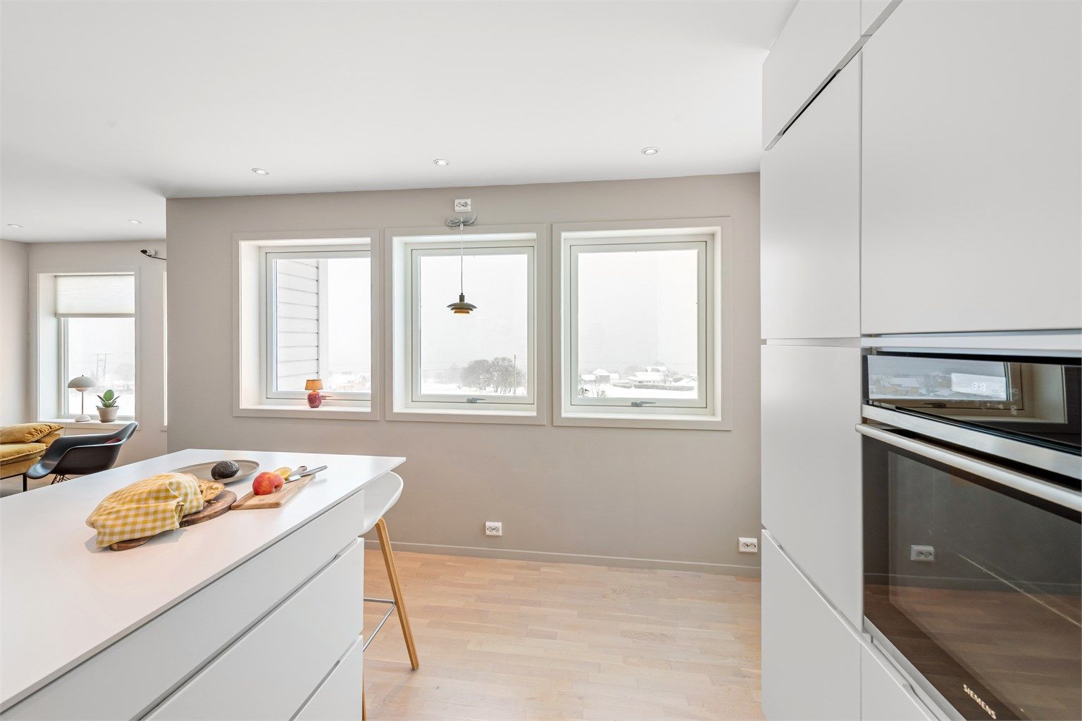 Kjøkkenventilator med avtrekk ut sørger for godt inneklima under matlaging.