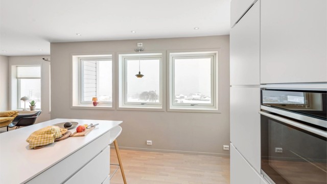 Kjøkkenventilator med avtrekk ut sørger for godt inneklima under matlaging.