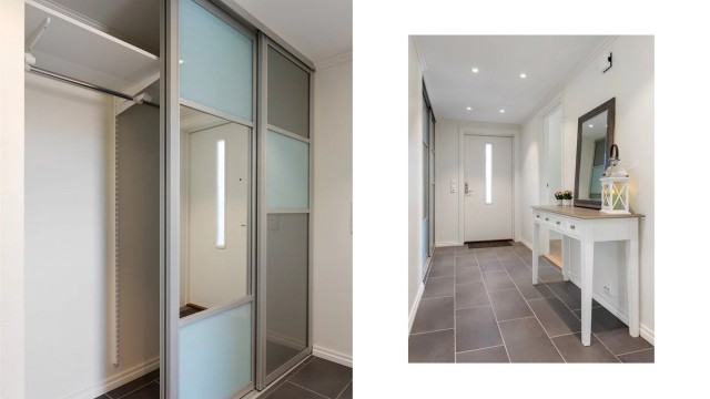 Romslig skyvedørsgarderobe i entréen gir rikelig med oppbevaringsplass.