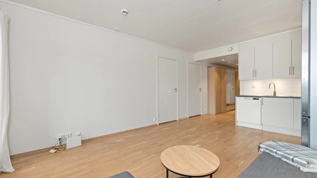 Det er også fin plass til en liten spiseplass mellom kjøkken og stue