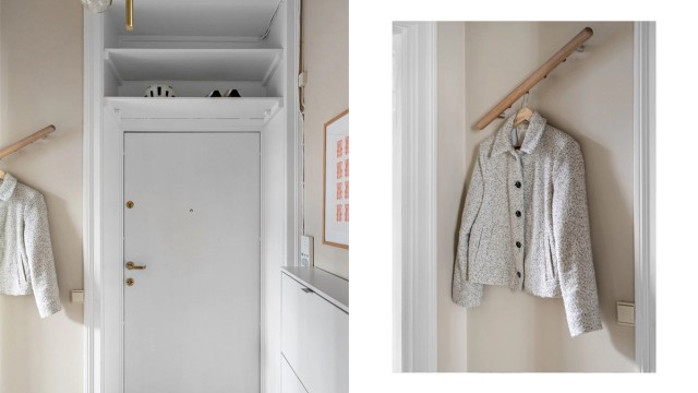 Entreen har lyse, delikate overflater og klassisk listverk i himling.