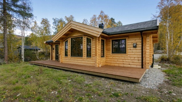 Velkommen til Solsida 38, en nyoppført laftet hytte på ett plan presentert av Eiendomsmegler Harald Osdal