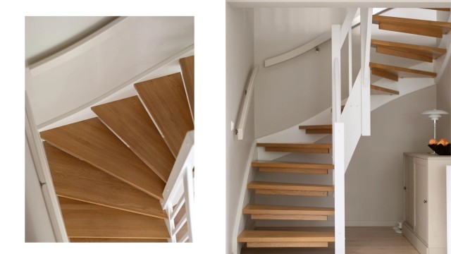 Trappen i trekonstruksjon med åpne trinn forbinder de to etasjene på en elegant måte.