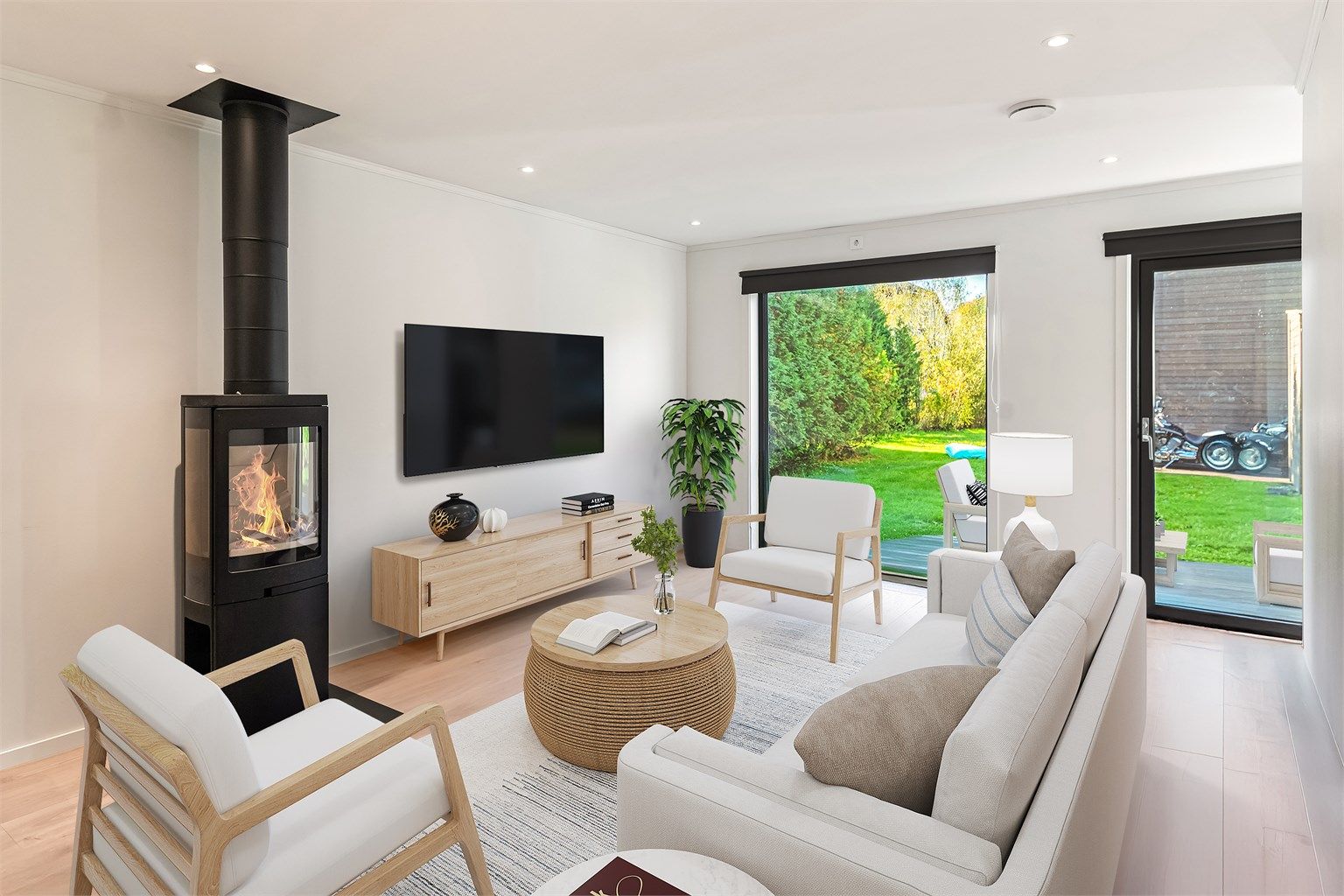 Stue med utgang til hage, digitalstylet. Bilde er tatt i en tilsvarende bolig