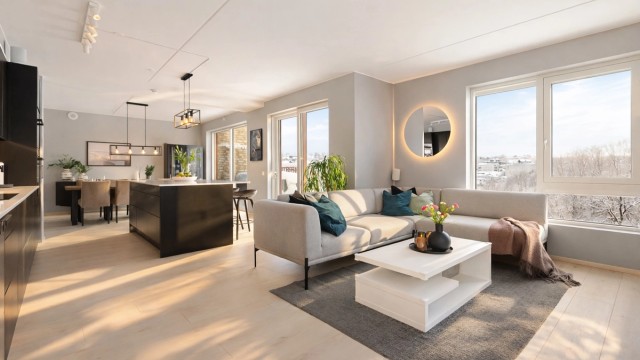 Lys og romslig stue med generøst lysinnslipp fra to himmelretninger