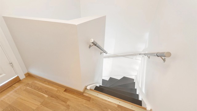 Trappen opp til loftsetasjen fra stuen i 2.etasje.
