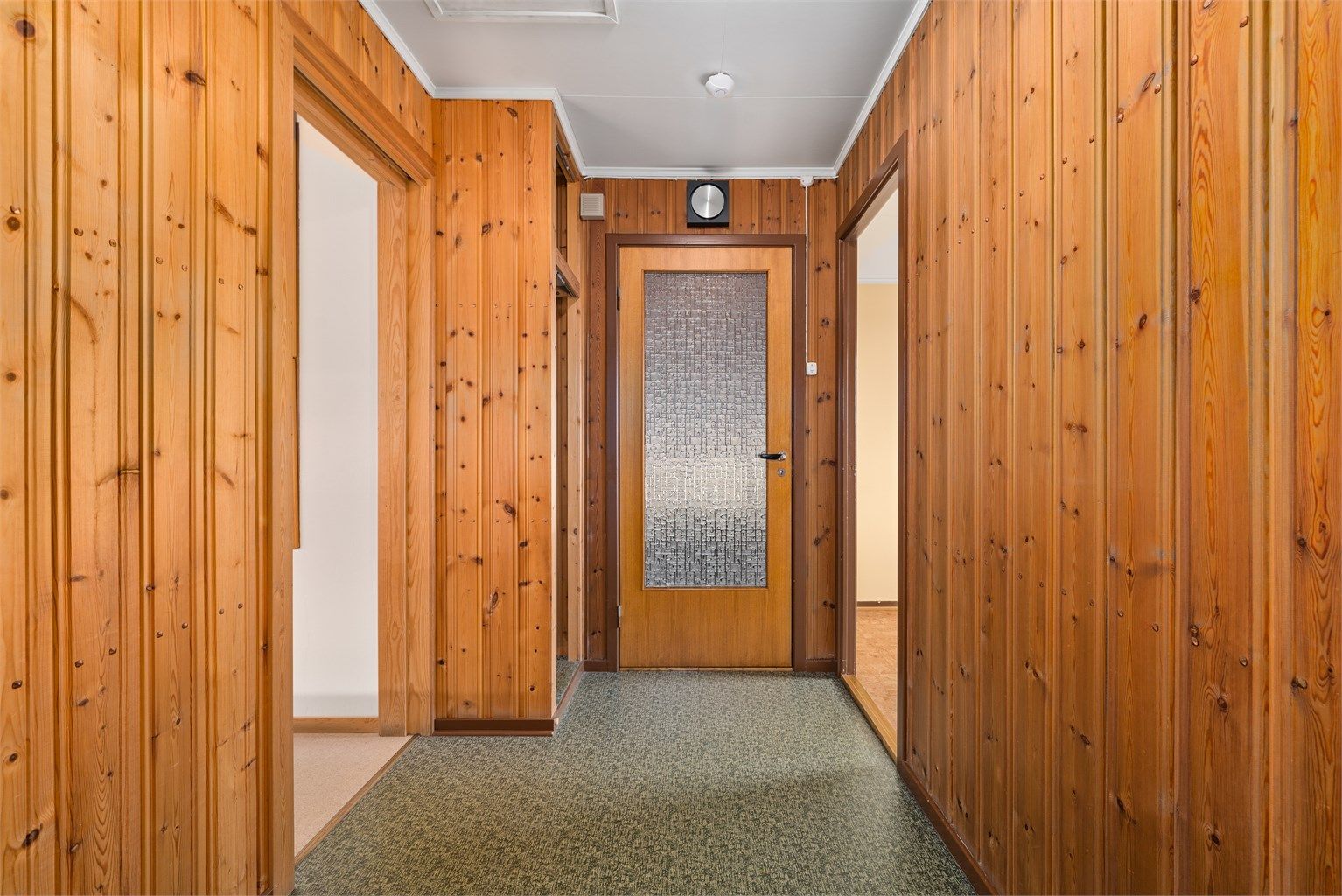 Gangen binder sammen entréen med soverommene og oppholdsrommene i etasjen.