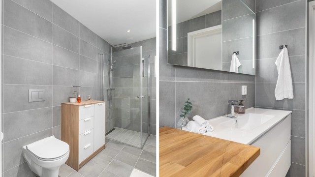 Fliser i grå nyanser på gulv og vegger gir badet helhet.
Spottene innfelt i himlingen kan dimmes.