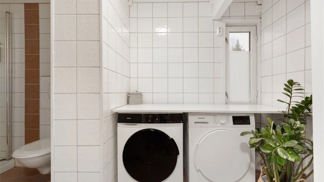 En del med plass til vaskemaskin og tørketrommel