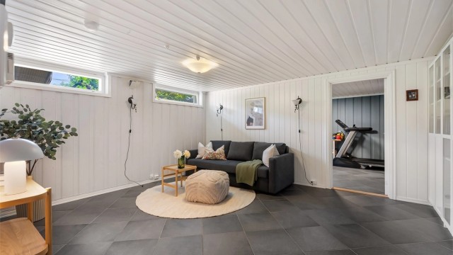 Kjellerstuen gir ekstra plass for familien, med adkomst til et eget treningsrom.